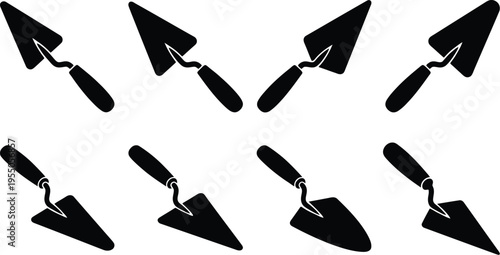 Set of eight black trowel icons with angled handles and triangular blades on a white background trowels