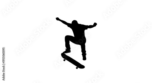 Silhouette of a Skateboarder Performing a Trick in Mid-Air