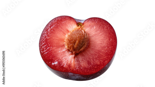 Photos Isolated ripe red plum half revealing juicy fruit flesh and central seed pit