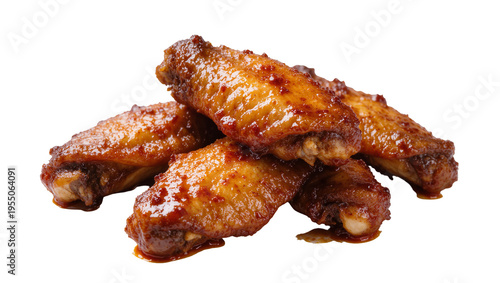 Isolated tasty and spicy glazed chicken wings piled together for a delicious meal