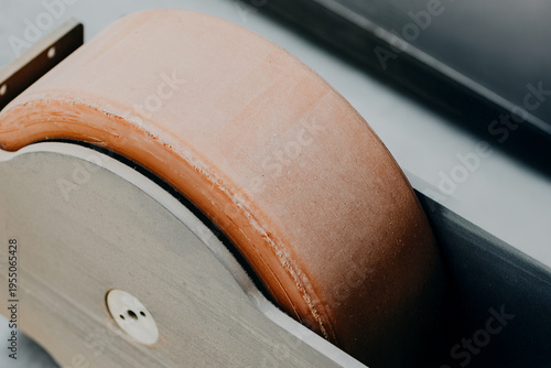 Close up of forklift wheel mounted on industrial vehicle