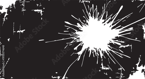 Grungy white paint splatter on distressed black background texture