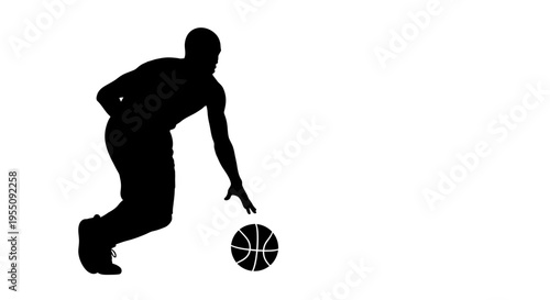 Silhouette of a Basketball Player Dribbling Ball