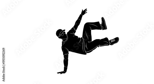 Silhouette of a Breakdancer Performing a Dynamic One-Handed Freeze