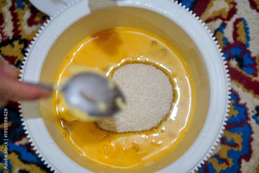 custom made wallpaper toronto digitalRaw eggs in a bowl with intact yolks, representing basic cooking ingredients and food preparation in the kitchen.