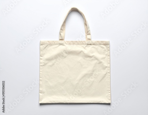 Plain Beige Canvas Tote Bag Against White Background Studio Shot