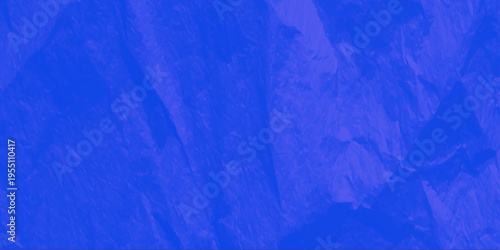 Abstract blue background with space featuring a dark textured grunge pattern and light paint brushstrokes on a purple fabric material surface wallpaper