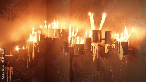 Candles dripping wax arrangement in a church