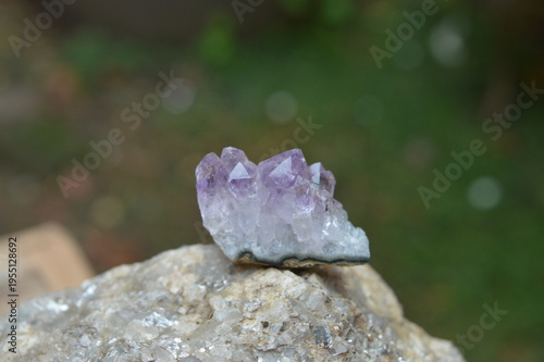 Amethyst stone on the rocks