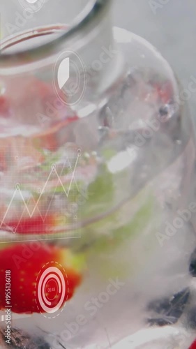 Vertical video: Camera tilting, bottle fruit swirling as bowl sliding in, HUD overlaying showcasing