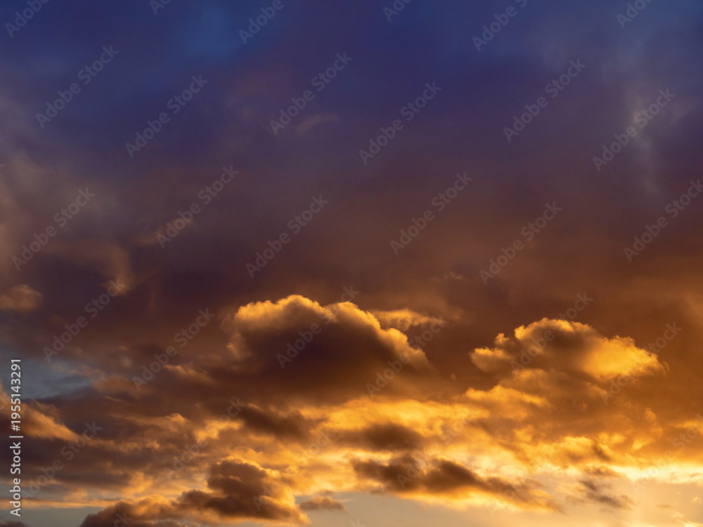 Fototapeta premium Dark dramatic sunset sky. Nature background for design. Strong colors.