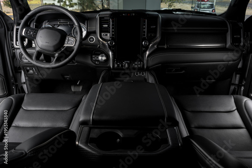 black Interior of luxurious car with modern details, leather seats and touch screen