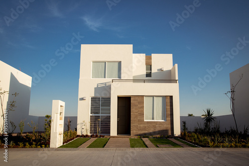 Beautiful house with minimalist architecture, sunny day