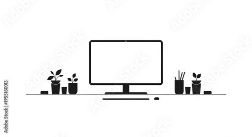 Minimalist desk setup with computer monitor and plants