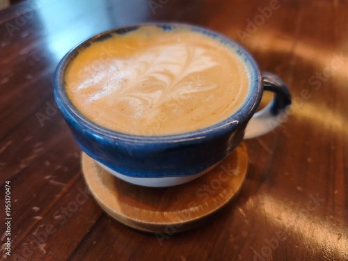 Caffeine moment in blue ceramic cup
