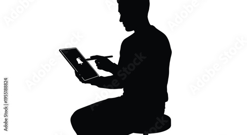 Silhouette of a man sitting and drawing on a digital tablet with a stylus, creative technology concept