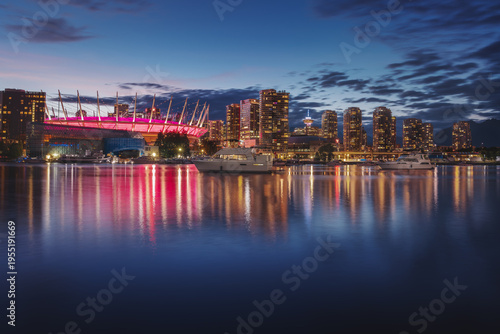 Vancouver city Skyline at night with False Creek and BC Place Stadium - Vancouver, British Columbia, Canada