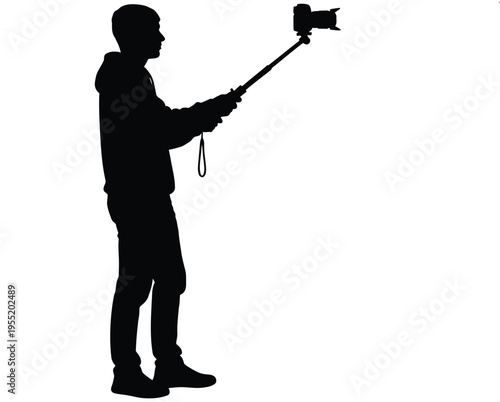 Vector silhouette of a man taking a selfie with a monopod