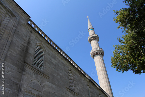 Suleymaniye Mosque  September Summer 2024 Minaret  under blue sky Istanbul