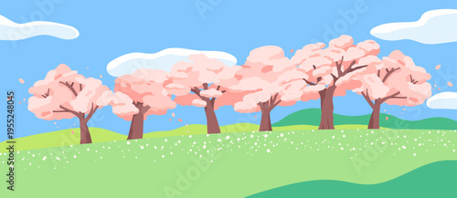 Cherry blossom trees on green meadow spring landscape