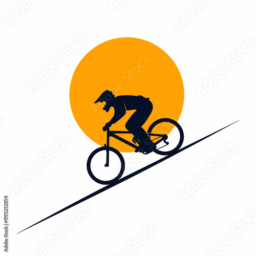 Silhouette of mountain biker jumping against sunset sun