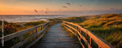 Serene Coastal Boardwalk at Sunset with Ocean Waves and Flying Birds.