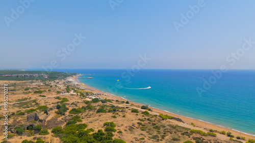 Wallpaper Mural Side, Manavgat, Turkey. Panoramic drone flight around ancient peninsula with archaeological ruins, modern city, bays and beaches on Mediterranean coast, summer aerial view Torontodigital.ca