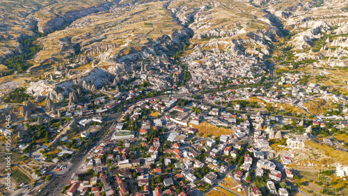 Wallpaper Mural Goreme, Nevsehir, Turkey. Summer morning panorama of Goreme village and its dramatic valley setting with distinctive rock formations in Cappadocia.. Aerial View Torontodigital.ca