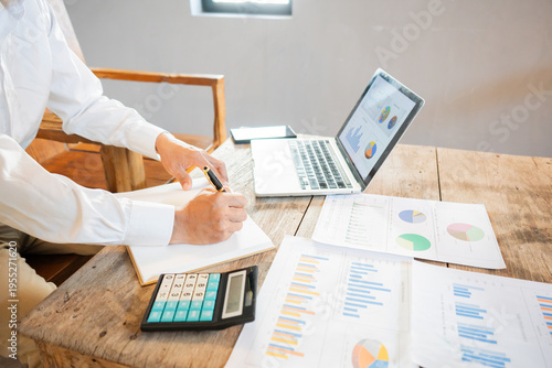 Real estate agents and clients are smiling and discussing property sales contracts, mortgages, investments, signing documents, purchase planning, ownership, and successful home sales transactions.