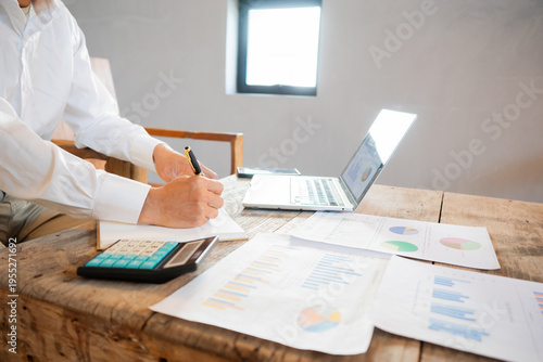 Real estate agents and clients are smiling and discussing property sales contracts, mortgages, investments, signing documents, purchase planning, ownership, and successful home sales transactions.