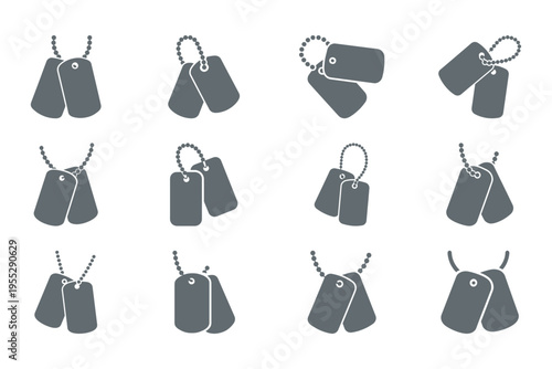 set of gray dog tags on chains, military identification tokens