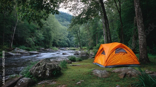 Serene camping site by a flowing river.