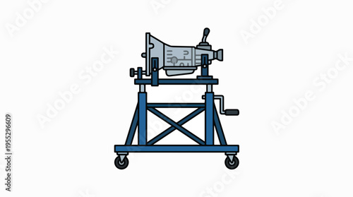 A simple illustration shows a grey automatic transmission mounted on a blue, wheeled workshop stand, with black outlines on a white background.