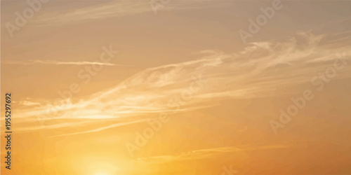 Beautiful sunset sky with glowing sun rays and soft clouds over a colorful horizon