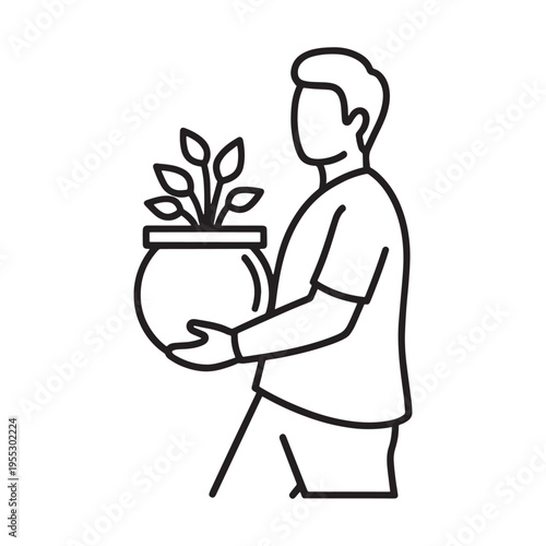 Woman holding small potted plant with green leaves in indoor setting