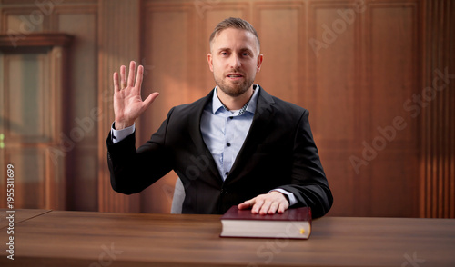 Bild auf Leinwand Attorney Takes Official Oath With Hand On Book Ahead