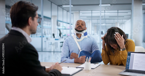 Bilde på lerret Dedicated Attorney Reviews Injury Claim While Client Feels Frustrated