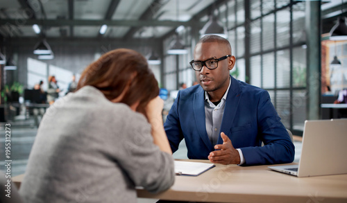 Принти на полотні Young Woman Looks Unhappy During A Tough Office Meeting With HR Staff