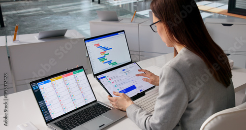 Agile Business Trainer Organizes Schedule While Reviewing Emails