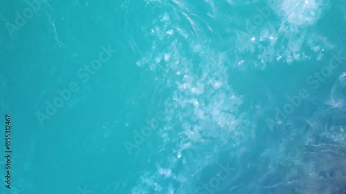 Aerial Churning Turquoise Surf Foam Waves Capturing Turbulent Water Motion, Swirling White Froth, Spray And Rhythm, High Energy Coastal Texture Ideal For Adrenaline And Oceanography Scenes