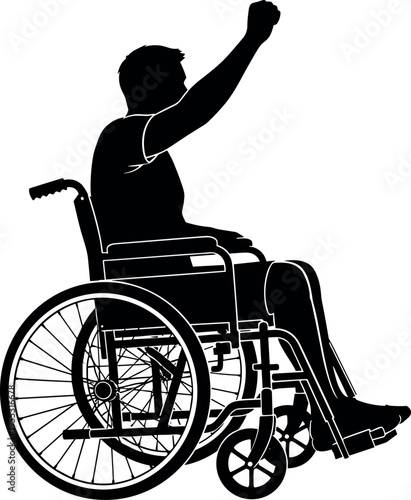 Silhouette of a young man in a wheelchair raising his fist in a gesture of success, victory, empowerment, and independence.