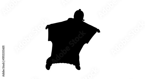 Silhouette of a Wingsuit Skydiver Flying in the Air