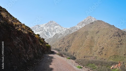 Walking along a scenic path in the Atlas Mountains, Morocco