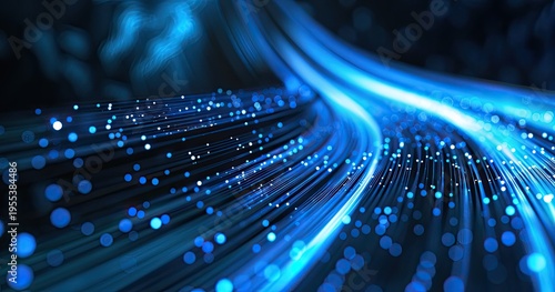A dynamic visualization of flowing blue light and particles, representing technology and data.