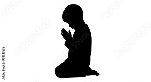 Silhouette of a praying child.