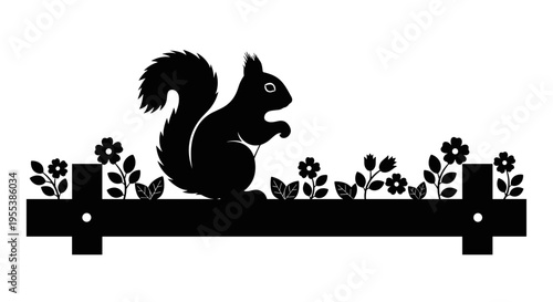 Squirrel Silhouette on Fence.