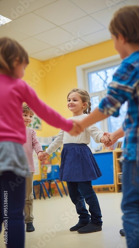 In choreography class, kids dance in a circle while holding hands.