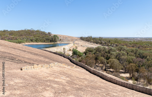 Wallpaper Mural 
Wall above Wave Rock to funnel rain water into a drinking water storage dam on the Hayden Rock Walk in Western Australia, Australia
 Torontodigital.ca