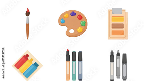 Artistic tools arranged on a surface for creative projects