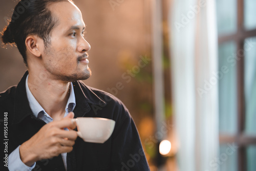 Εκτύπωση καμβά Asian man adult male beard ponytail coffee cup mug casual indoor side profile wi